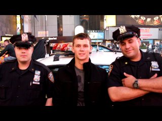 russian tourist takes a picture with american cops